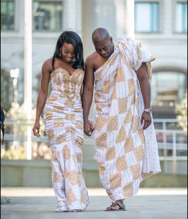 Clipkulture | Couple in Gold and White Kente Traditional Wedding Attire