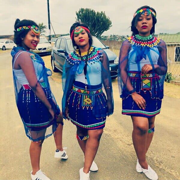 Clipkulture | Bridesmaids In Blue Zulu Patterned Skirts With Sneakers ...