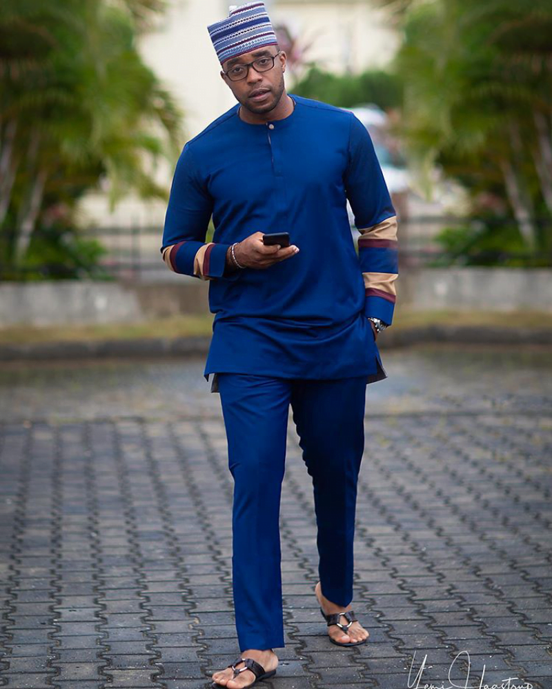 Clipkulture | Man In Blue Kaftan With Mixed Sleeves and Bama Cap