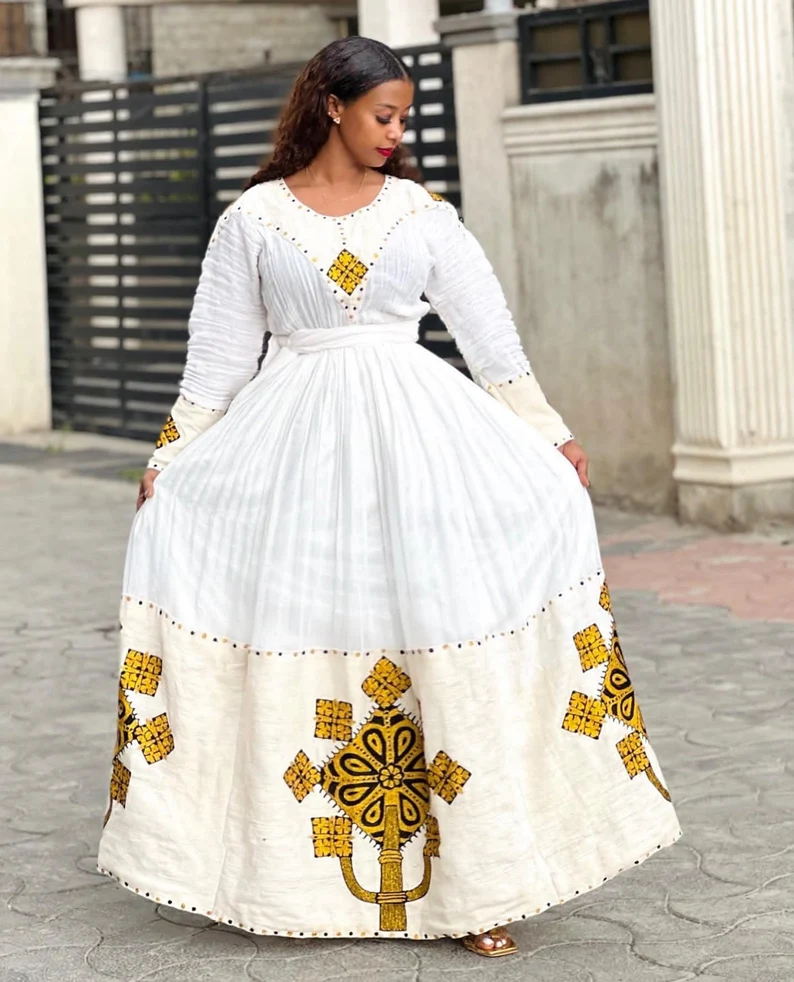 Elegant Habesha Kemis - Traditional Ethiopian Dress with Purple & Gold Embroidery